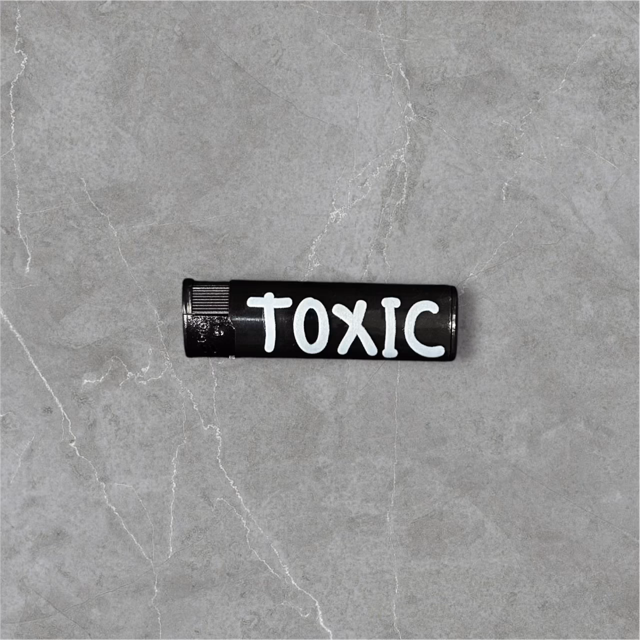 Зажигалка пьезо газовая "TOXIC"
